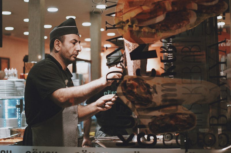 Hangry Joe's staff member behind the counter