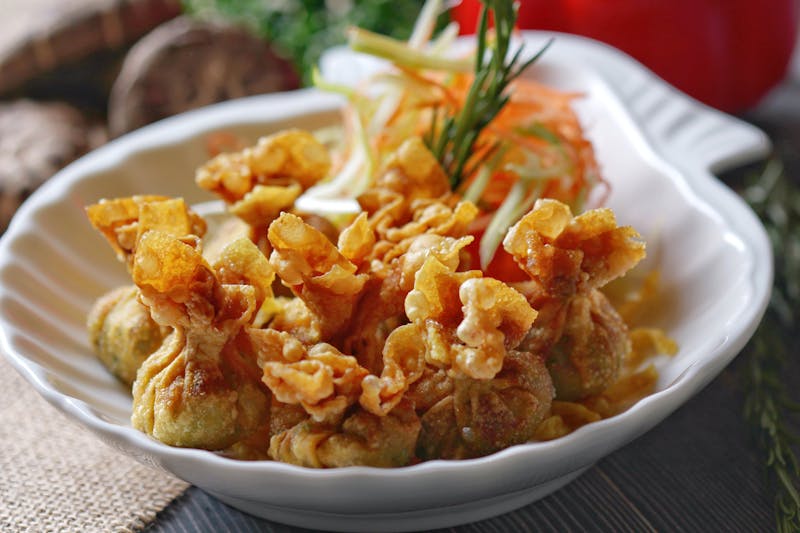 Crispy golden seasoned french fries in a basket